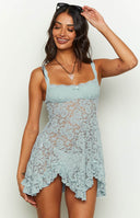 Blue lace mini dress on brunette model